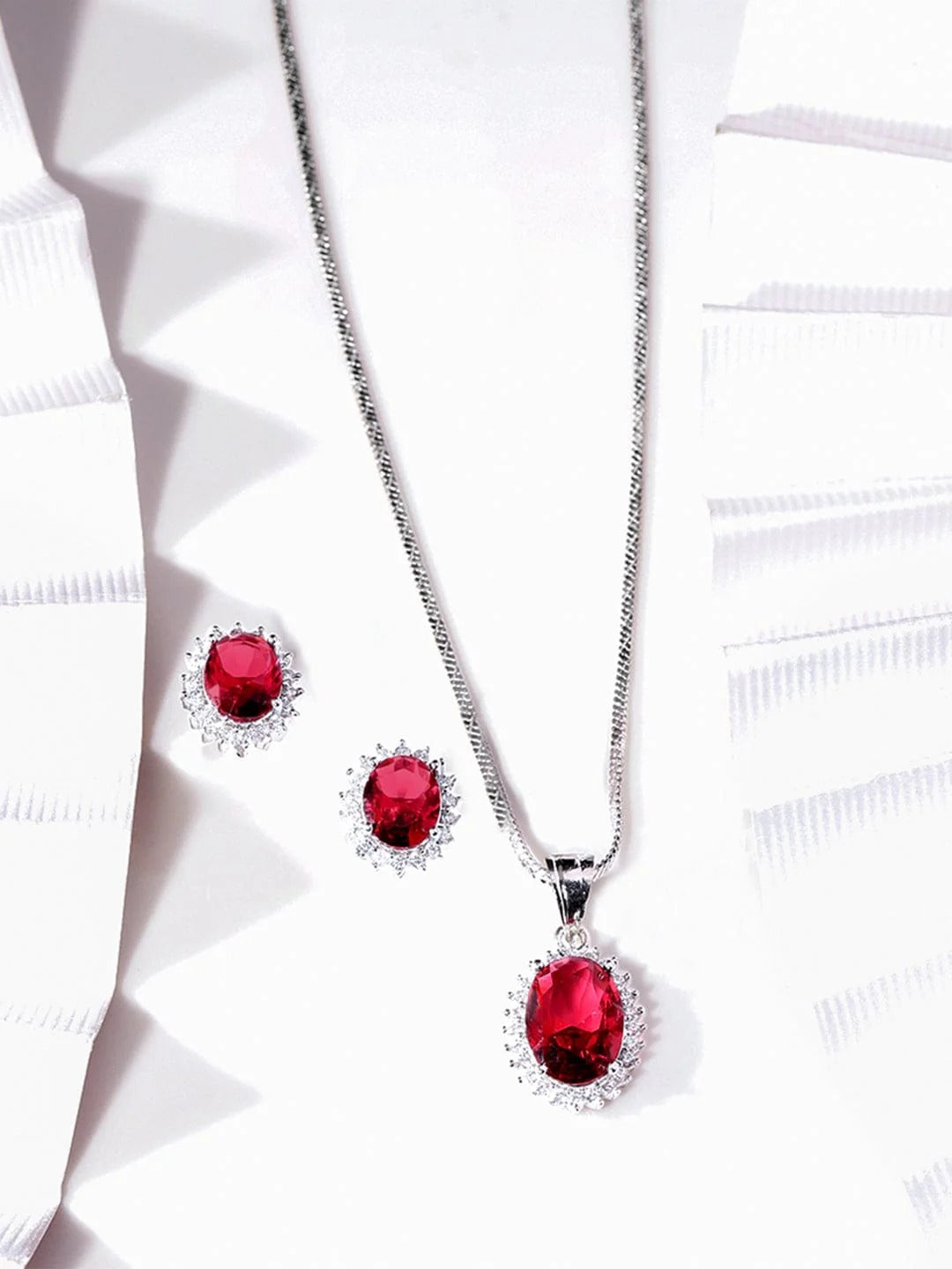 Rhodium-Plated Ruby Red Zirconia Oval Pendant Set – Timeless Glamour and Style